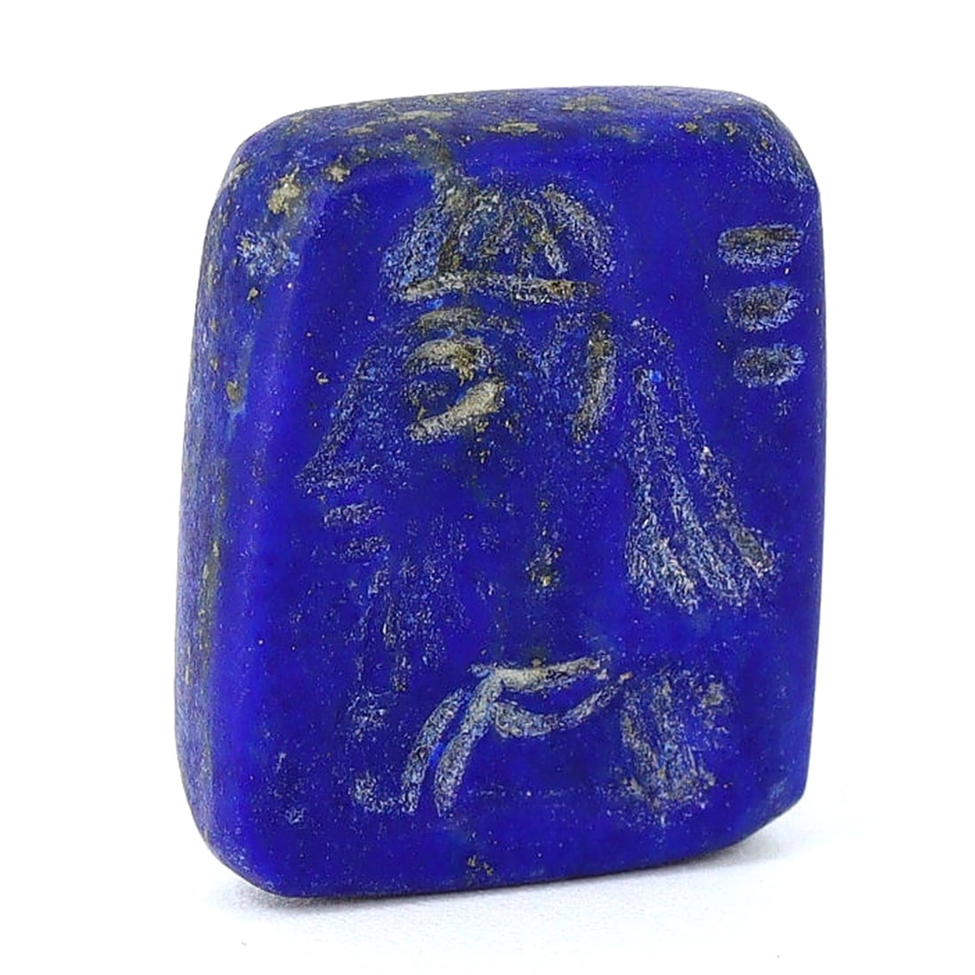 Byzantine Lapis Lazuli Stamp Seal with Engraved Figure (600-700 AD): This lapis lazuli stamp seal, sized at 1.5x1 cm or approximately 0.59x0.39 inches, features an engraved figure that is indicative of the Byzantine era, specifically dated to 600-700 AD. The engraving 