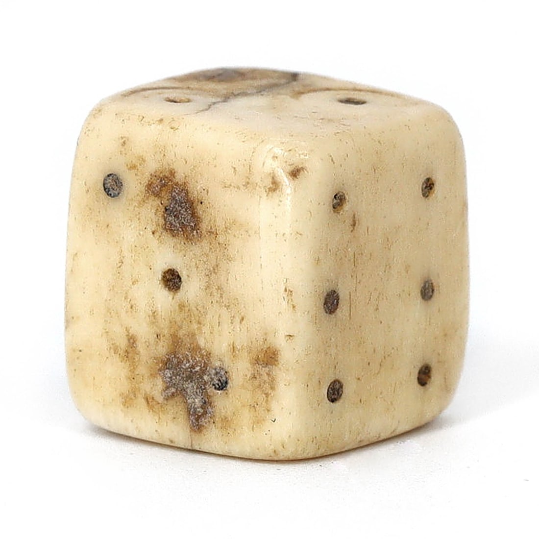 Ancient Roman Bone Dice, Circa 1st-2nd Century AD: This Roman period dice, a small yet significant artifact from the 1st to 2nd century AD, is crafted from bone, with dimensions of 1.2x1 cm and a weight of 4 grams. The dice boasts a patina that speaks