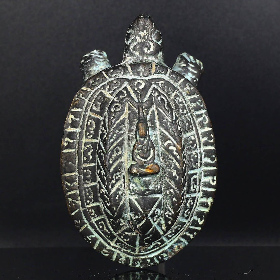 4 inches Tibetan Mantra Inscribed Brass Tortoise with Buddha Figurine: This brass sculpture, a Tibetan-inspired piece, intricately features Buddhist mantras inscribed across the shell of a tortoise, a symbol of longevity and wisdom. Measuring 12 cm in length and 7 cm in 