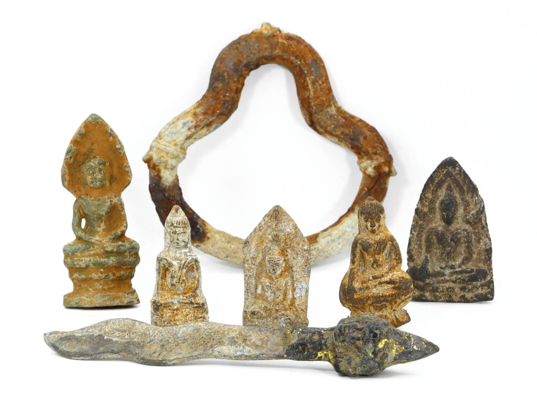 Group of 7 Angkorian Period Bronze Sculptures from Southeast Asia: Spanning across the centuries of the Angkorian period, this collection of seven ancient sculptures from Cambodia, Laos, and Thailand offers a tangible connection to Southeast Asia's illustrious past. 