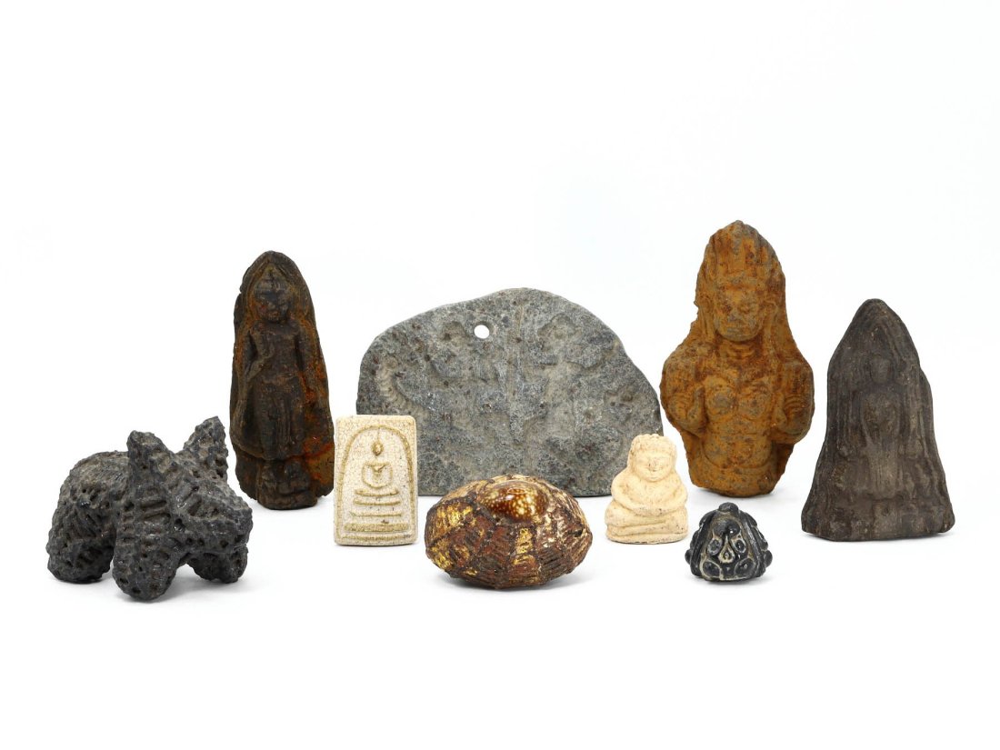 Group of 9 Central Asian Steatite and Himalayan Sculptures: This collection consists of nine old antique sculptures, showcasing a convergence of artistic traditions from Central Asia, the Himalayas, and Southeast Asia. The centerpiece is a steatite plaque, the