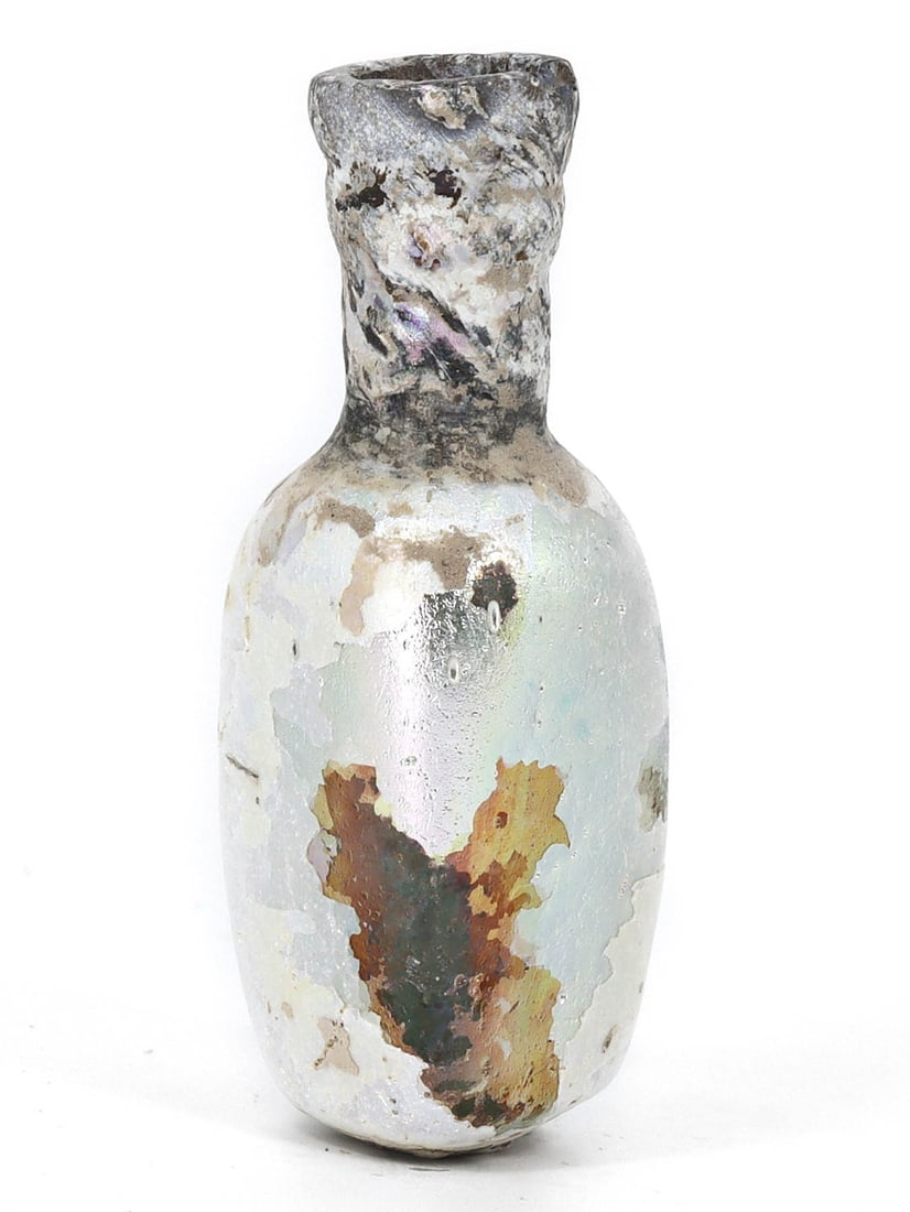 Roman-Byzantine Glass Vessel/Bottle (1st-7th Century AD): This exquisite glass vessel, dating back to the Roman-Byzantine era spanning the 1st to 7th century AD, is a testament to the ancient artistry of glassmaking. Measuring 5.5x2cm, it showcases the skill