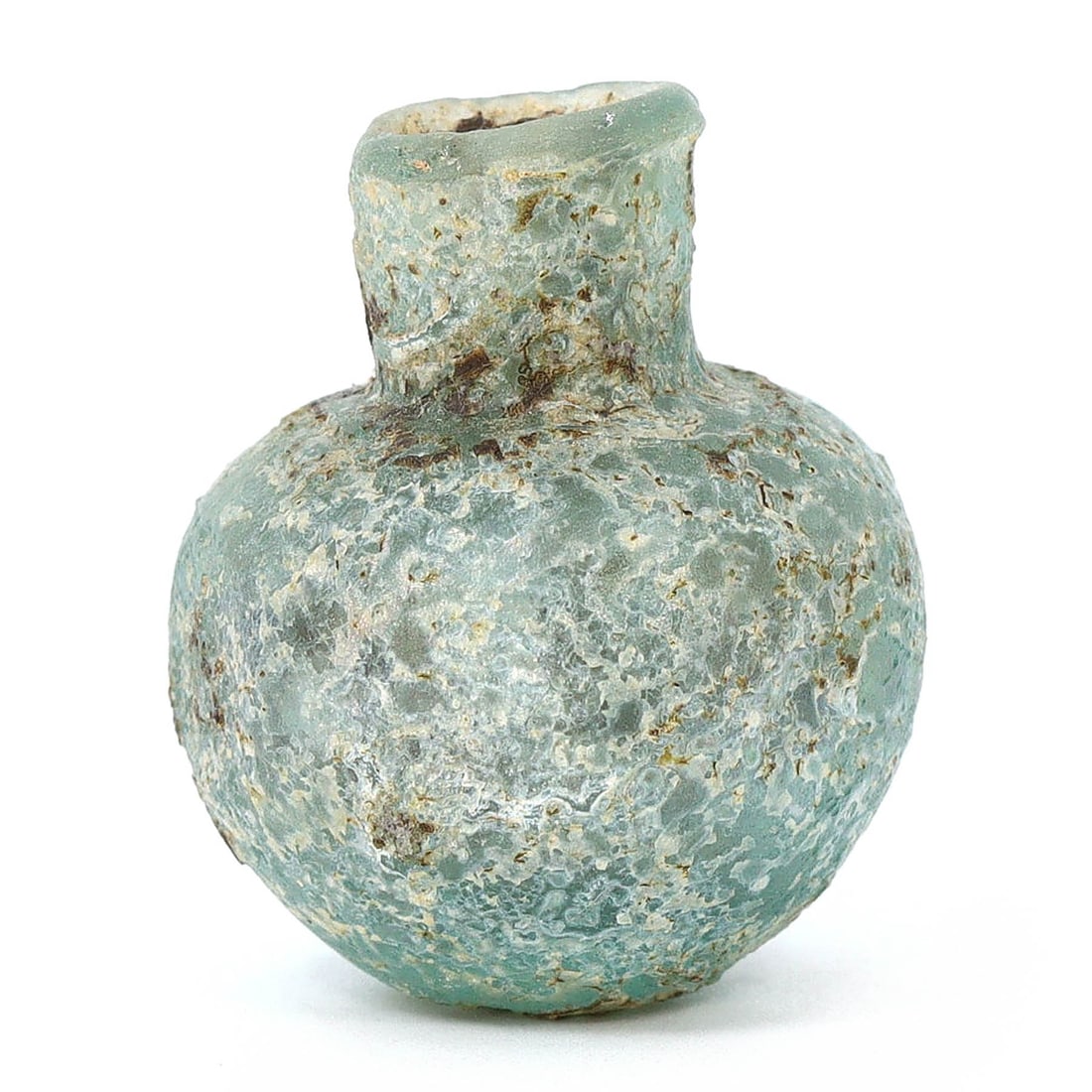 Roman-Byzantine Glass Vessel/Bottle (1st-7th Century AD): This exquisite glass vessel, dating back to the Roman-Byzantine era spanning the 1st to 7th century AD, is a testament to the ancient artistry of glassmaking. Measuring 3x2.5cm, it showcases the skill