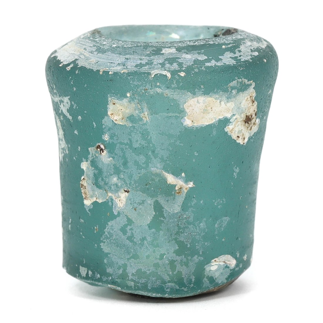 Roman-Byzantine Shot Glass (1st-7th Century AD): This exquisite shot glass, dating back to the Roman-Byzantine era spanning the 1st to 7th century AD, is a testament to the ancient artistry of glassmaking. Measuring 3.2x3x2.8cm, it showcases the ski
