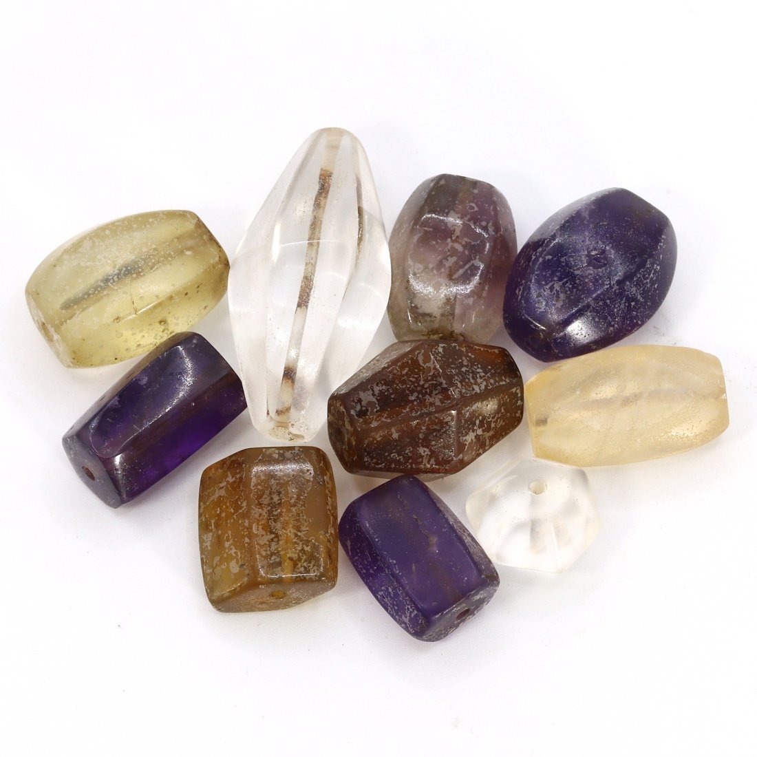 Group of 10 Roman Era Faceted Amethyst, Crystal, and Quartz Amulets (27 BC - 476 AD) (1 of 1)