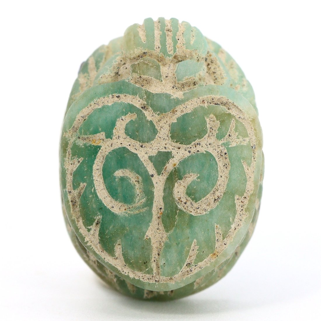 Byzantine Egypt Green Beryl Scarab Amulet with Soldier Engraving (330-1453 AD): The dimensions of this finely crafted scarab amulet are 19 mm by 14 mm by 9 mm, which translates to approximately 0.75 inches by 0.55 inches by 0.35 inches. Carved from green beryl, a gemstone revered