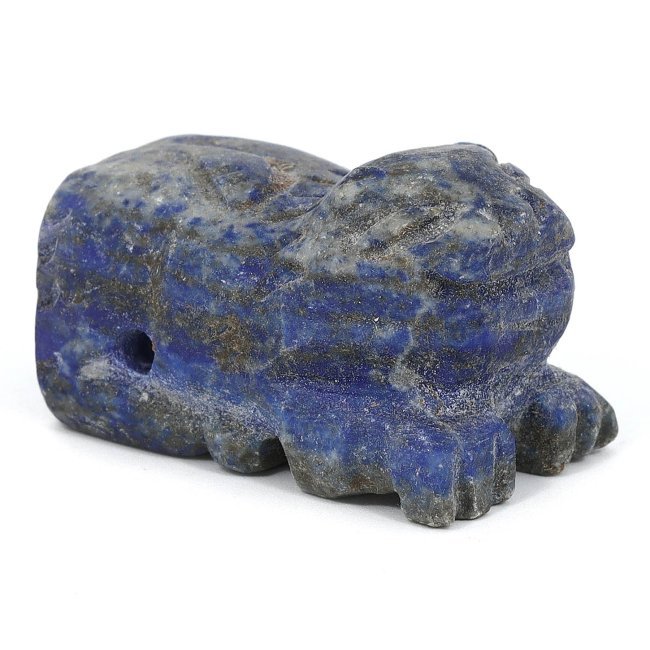 Egyptian-Persian Lapis Lazuli Crouching Lion Amulet (7th-4th Century BCE): This ancient crouching lion figure amulet, carved from lapis lazuli, measures 3.5 cm by 2.5 cm by 2 cm (approximately 1.38x0.98x0.79 inches). The amulet dates back to the period straddling ancient Egy
