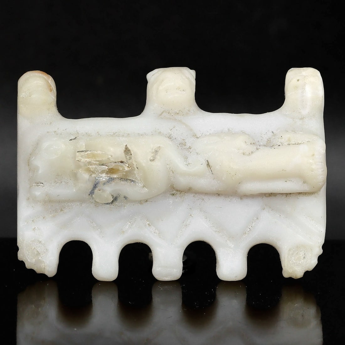 Renaissance Marble Sculpture with Seven Animal Faces, 15th-16th Century AD: Dimensions: 6.5x4.5 cm / 2.56x1.77 inches This intricately carved marble sculpture is attributed to the Renaissance period, specifically the 15th-16th century AD. It displays a compilation of seven an