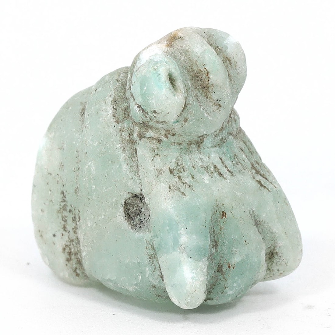 Ancient Egyptian Green Beryl Ram Amulet (1550-1070 BC): This exquisite ancient Egyptian amulet, dating back to the period between 1550 and 1070 BC, is a fine example of the craftsmanship of the era. Measuring 2x1 cm (0.79x0.39 inches), it is delicately cra