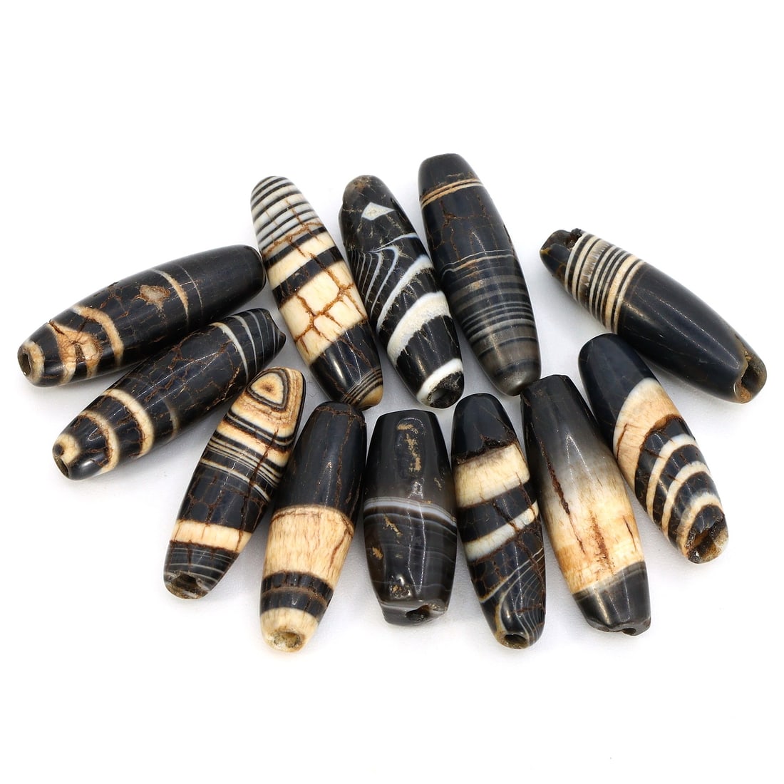 Tibetan Empire Striped Agate Sulemani Amulet Dzi Bead Collection (7th-9th Century AD) (1 of 2)