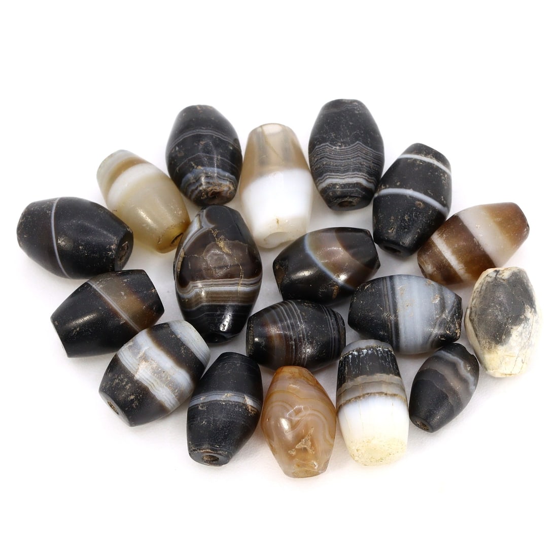 Group of 18 Tibetan Banded Agate Dzi Bead Amulets (Tibetan Empire-15th Century) (1 of 2)