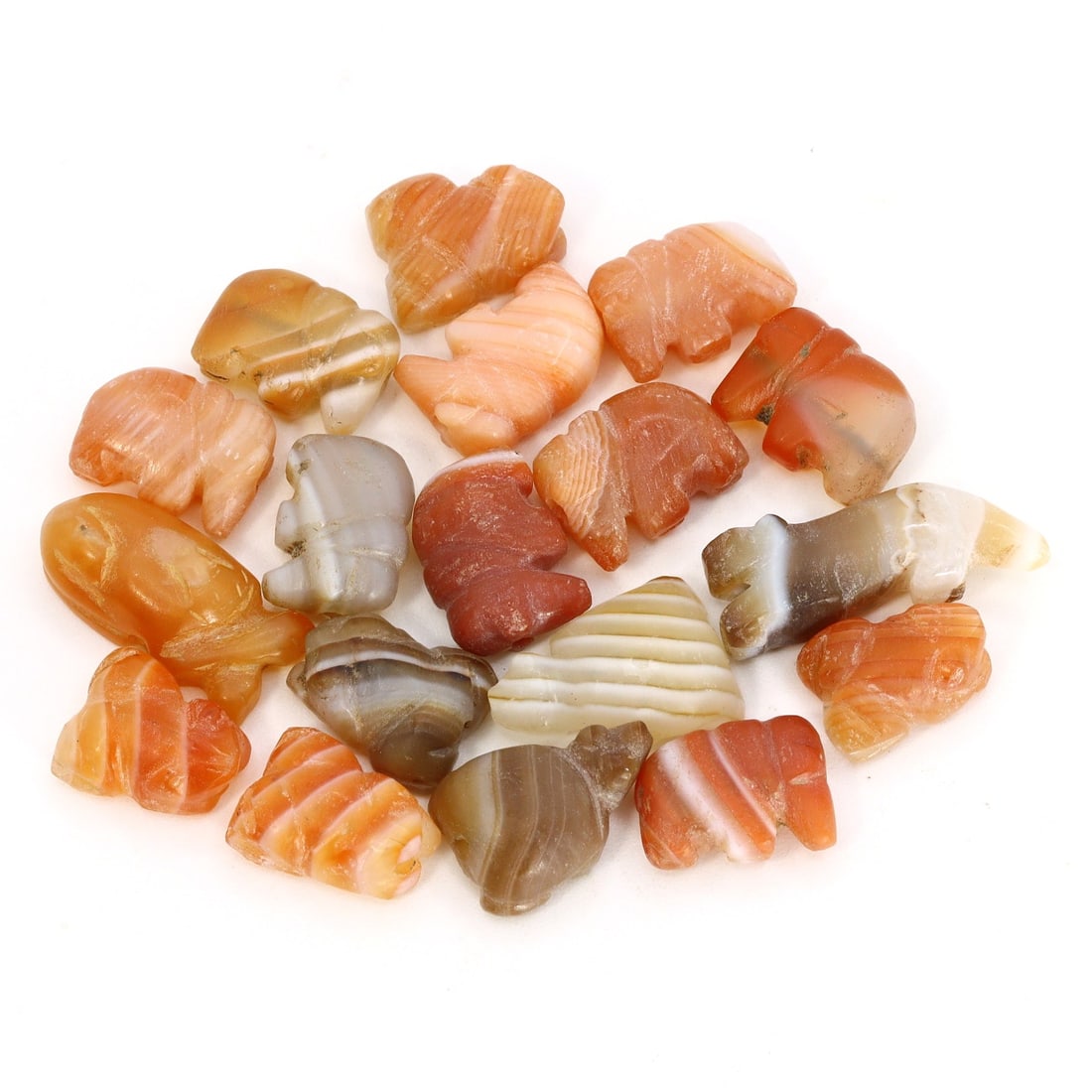Byzantine Egyptian and Gandharan Banded Agate Zoomorphic Amulets (4th-7th Century AD): This unique lot comprises 18 ancient Coptic zoomorphic amulets crafted from banded agate, with dimensions ranging from 10 to 19 mm (approximately 0.39 to 0.75 inches) each. These amulets originate fro