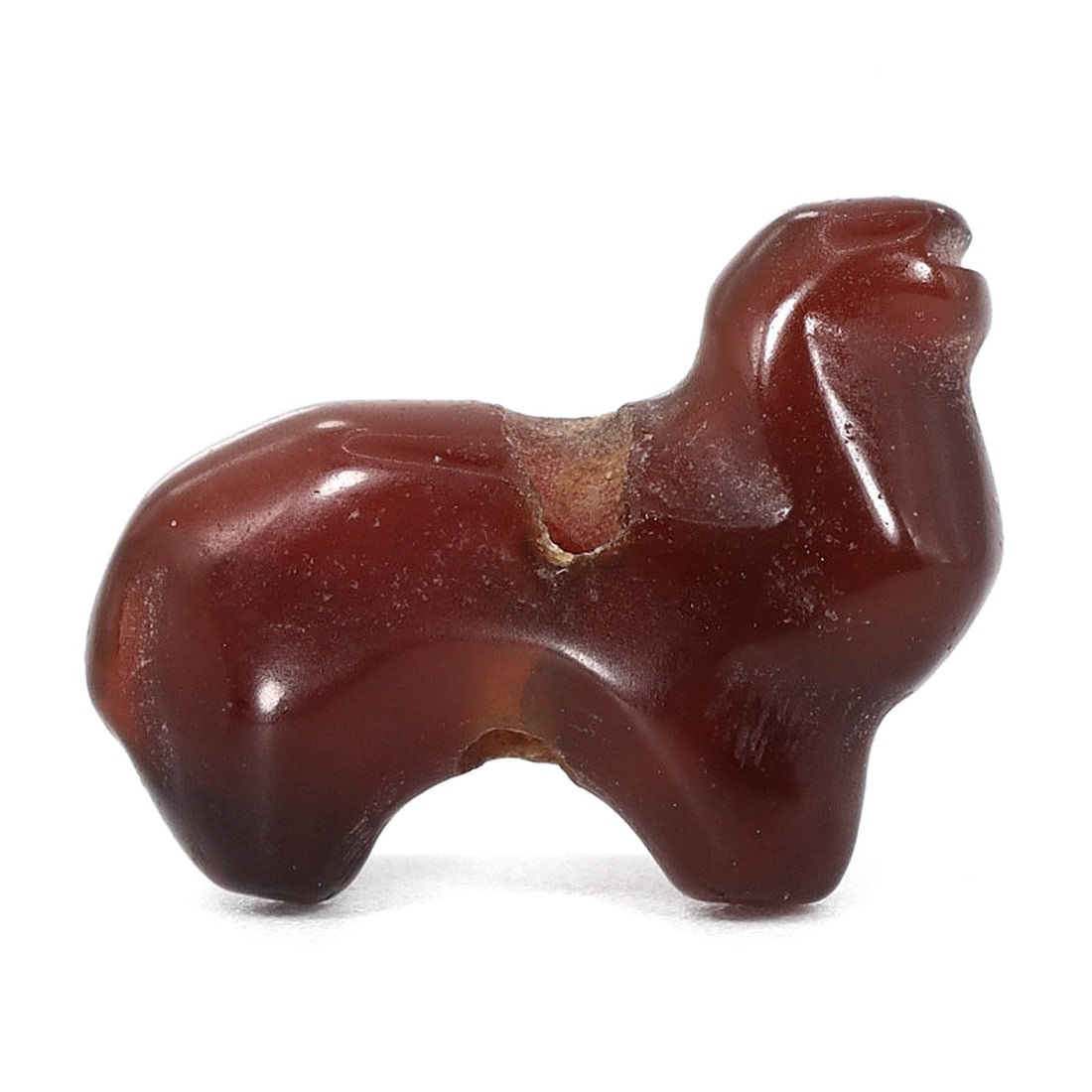Byzantine Egyptian Carnelian Coptic Lioness Amulet (4th-7th Century AD): This exquisite ancient relic is a Coptic lioness amulet made from carnelian, measuring 14x10x4 mm (approximately 0.55x0.39x0.16 inches) in size. Dating back to the 4th to 7th century AD during the Byz