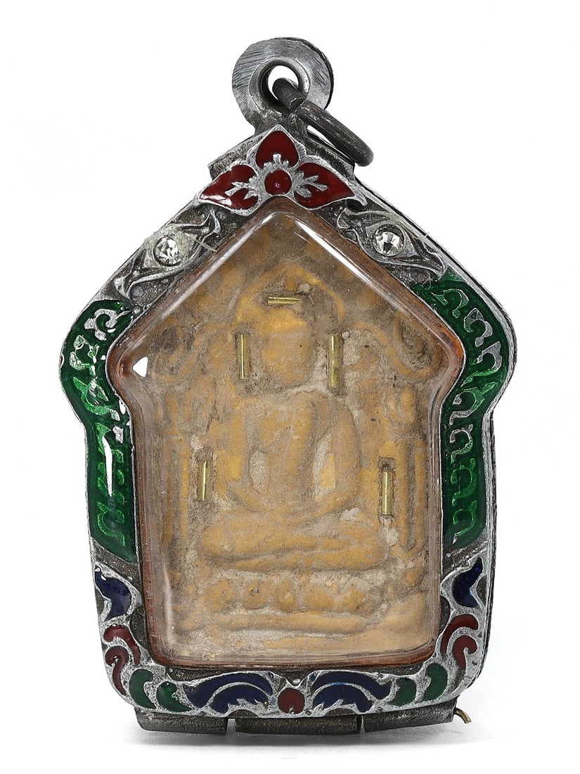 Siamese Terracotta Amulet in Enamel Tribal Silver Case Locket (18-20th Century AD): This Siamese amulet, framed in an exquisite enamel tribal silver case locket, measures 6x4 cm. The amulet, crafted between the 18th and 20th century AD, features an antique terracotta depiction of a B
