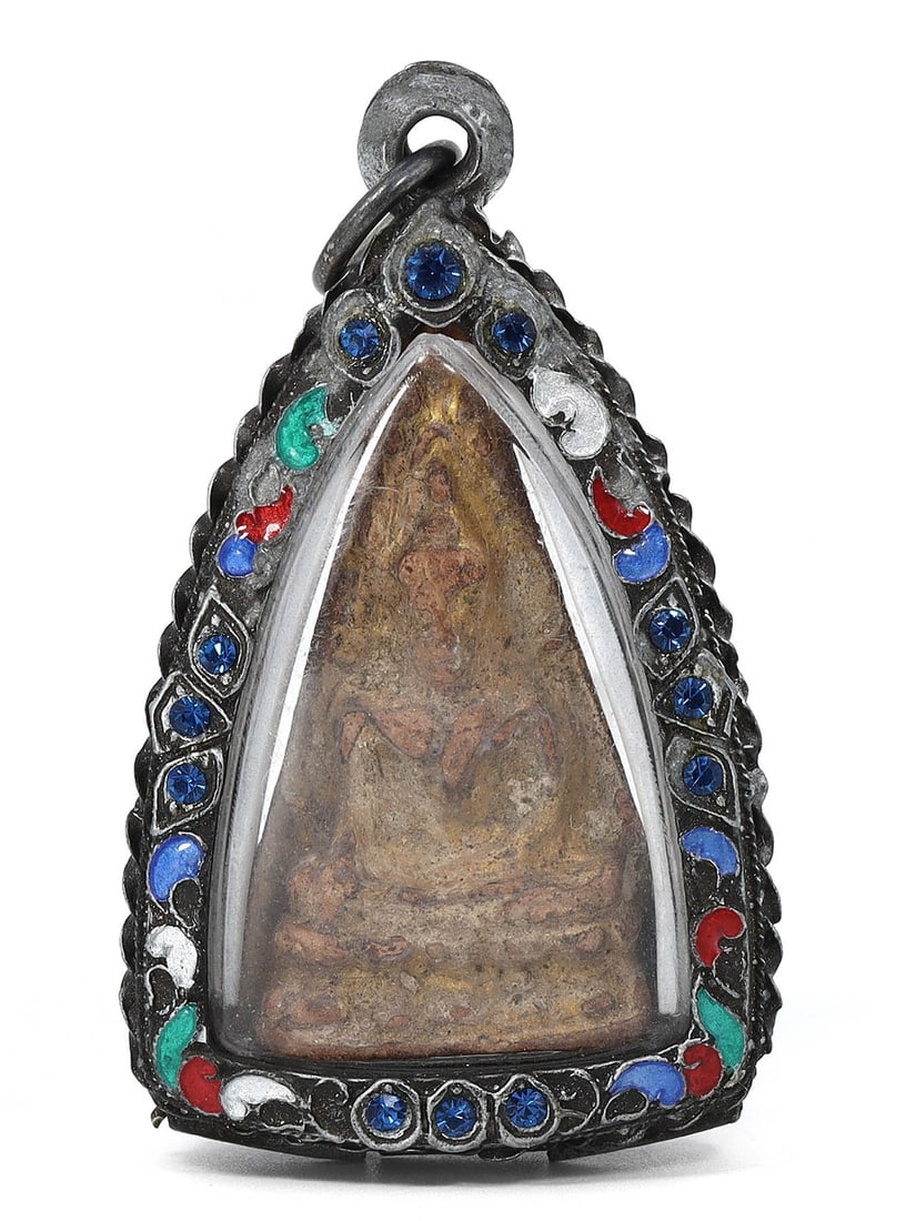 Siamese Terracotta Amulet in Enamel Tribal Silver Case Locket (18-20th Century AD): This Siamese amulet, framed in an exquisite enamel tribal silver case locket, measures 6x3.5cm. The amulet, crafted between the 18th and 20th century AD, features an antique terracotta depiction of a 