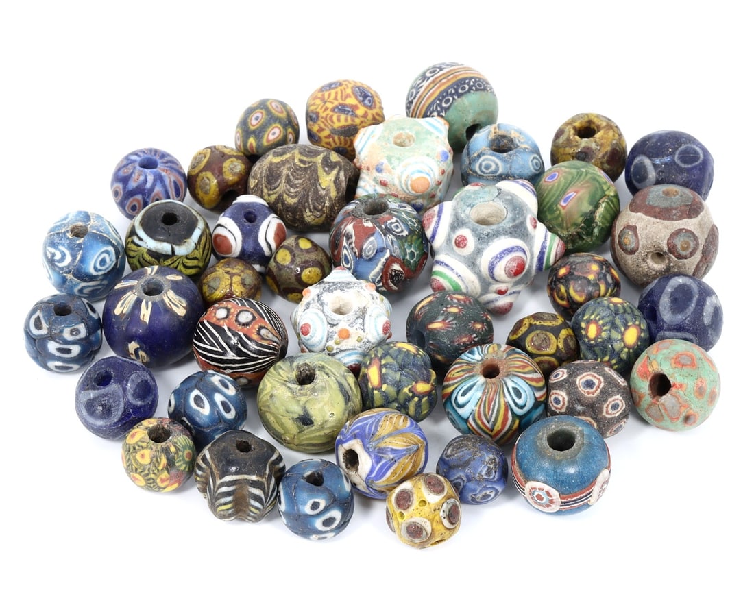 Group of 42 Vintage Art Deco Millefiori Glass Beads, Colorful Collectibles,with - Free Shipping: Dimension: 11-59mm Introduction: This exceptional collection of 22 Art Deco-era Millefiori glass beads reflects the exquisite craftsmanship of early 20th-century artisans. With dimensions ranging thes