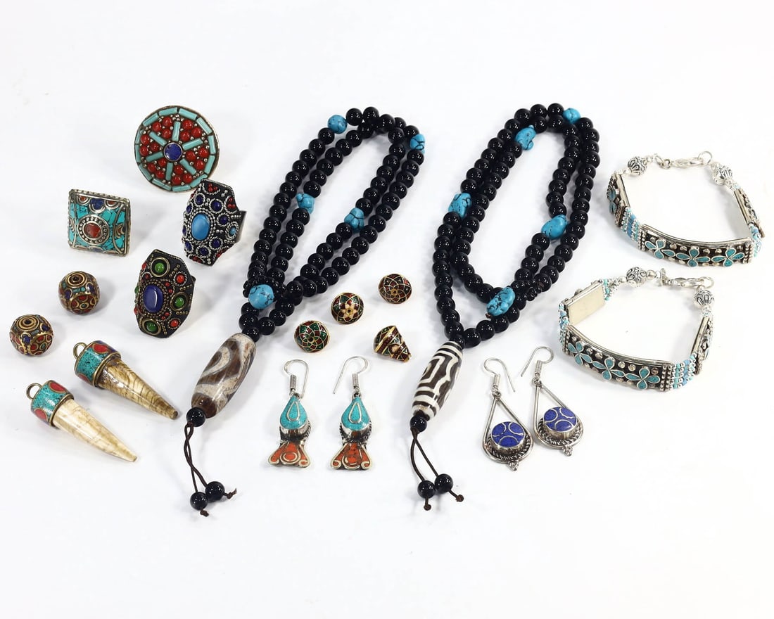 Group of 18 Tibetan, Himalayan & Central Asian Jewelry Pieces,with - Free Shipping: Dimension: 15inch Introduction: This lot presents a curated collection of 18 jewelry pieces, with a dimension range of approximately 38 cm (15 inches), which resonates with the rich heritage of Tibeta