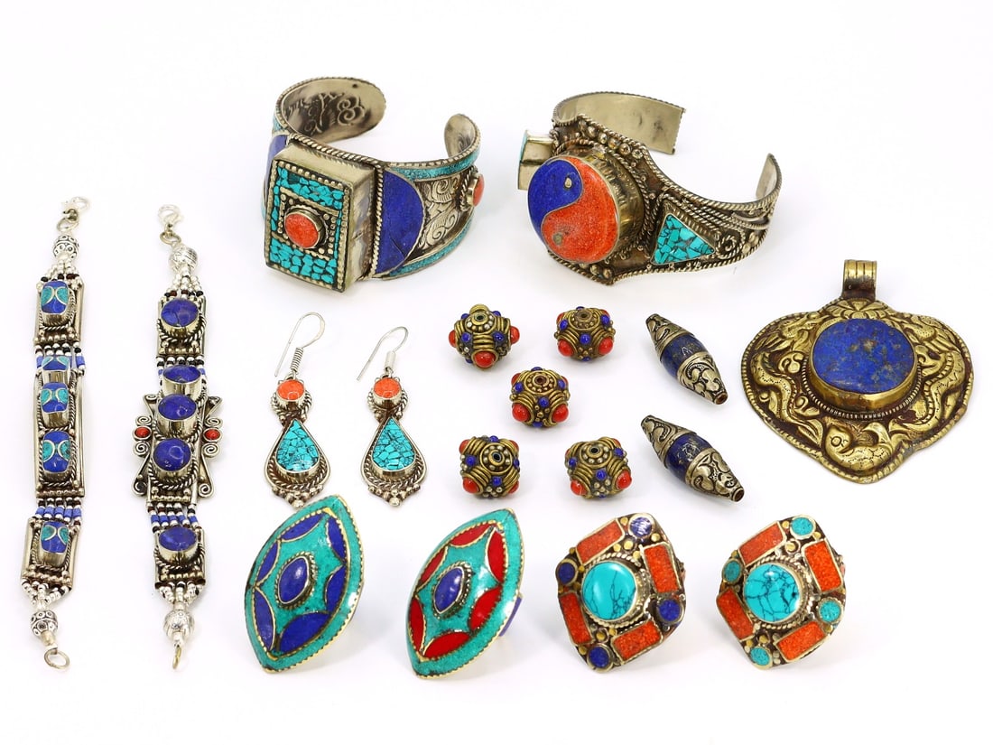 Group of 17 Tibetan and Central Asian Jewelry Pieces,with - Free Shipping: Dimension: 7 inches Introduction: This diverse collection of 17 jewelry pieces presents a vivid tableau of Tibetan, Himalayan, and Central Asian artistry. The lot includes an array of carefully crafte