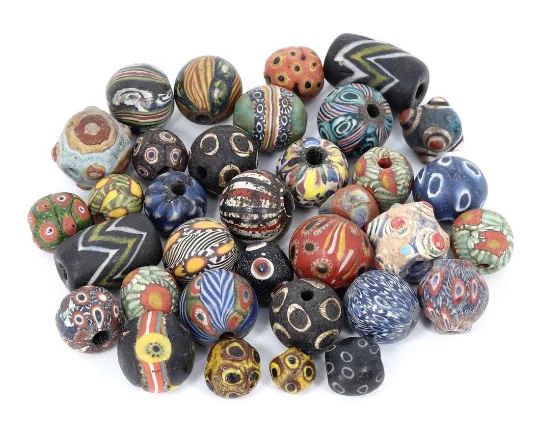 Group of 34 Vintage Art Deco Millefiori Glass Beads, Colorful Collectibles,with - Free Shipping: Dimension: 11-27mm Introduction: This exceptional collection of 34 Art Deco-era Millefiori glass beads reflects the exquisite craftsmanship of early 20th-century artisans. With dimensions ranging thes