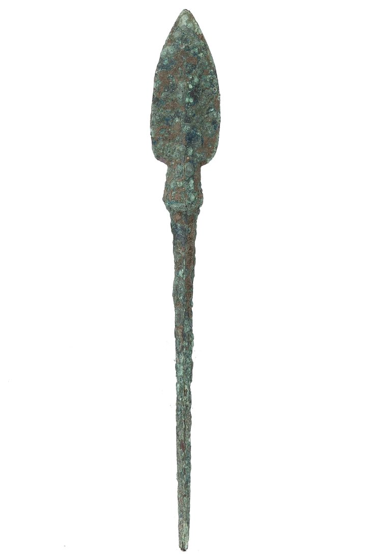 Ancient Cypriot Bronze Arrowhead, 12th-9th Century BC: A finely crafted bronze arrowhead from Cyprus, dating back to the 12th to 9th century BC, this piece measures 13 cm in length and 1.5 cm in width (5.1x0.6 inches). Its design and material are indicati