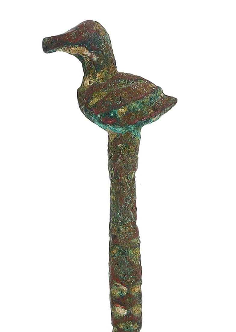 Ancient Luristan Bronze Bird Hair Pin (1000-650 BC): This ancient hair pin, complete with a bird figure at the top, measures 9.5 cm in length, which is approximately 3.74 inches. It is made from bronze and is characteristic of the Luristan culture, dati