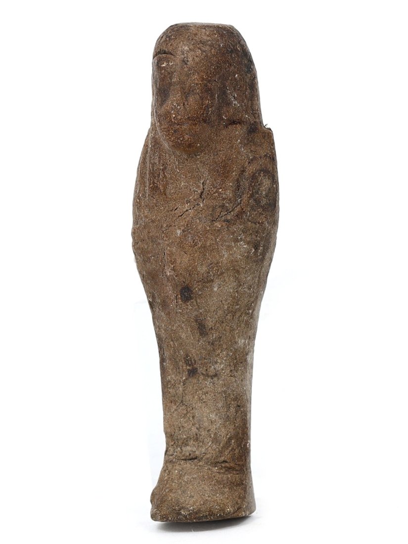 Terracotta Egyptian Ushabti Figurine, 13th-11th Century BC: This terracotta Ushabti stands 5.5 cm tall, 1.5 cm wide, and 1 cm deep (2.17 x 0.59 x 0.39 inches). Originating from ancient Egypt, dating between the 13th to 11th Century BC, it was part of the funer