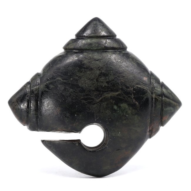 Sa Huynh Culture Nephrite Jade Ear Pendant, 500 BCE-300 CE: Expertly carved from nephrite jade, this ancient ear pendant from the Sa Huynh Culture of Northern Vietnam, spanning from 500 BCE to 300 CE, stands as a testament to the era's refined artistry. The di