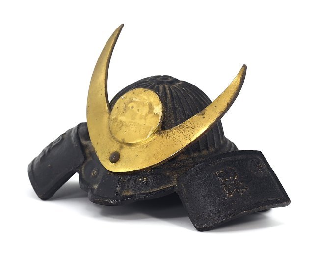 Vintage Showa Period Japanese Iron Kabuto, 20th Century: This Showa period Kabuto, or traditional Japanese helmet, is a striking example of 20th-century Japanese metalwork. With dimensions of 14x10x8 centimeters (5.5x3.9x3.1 inches), this iron helmet featur