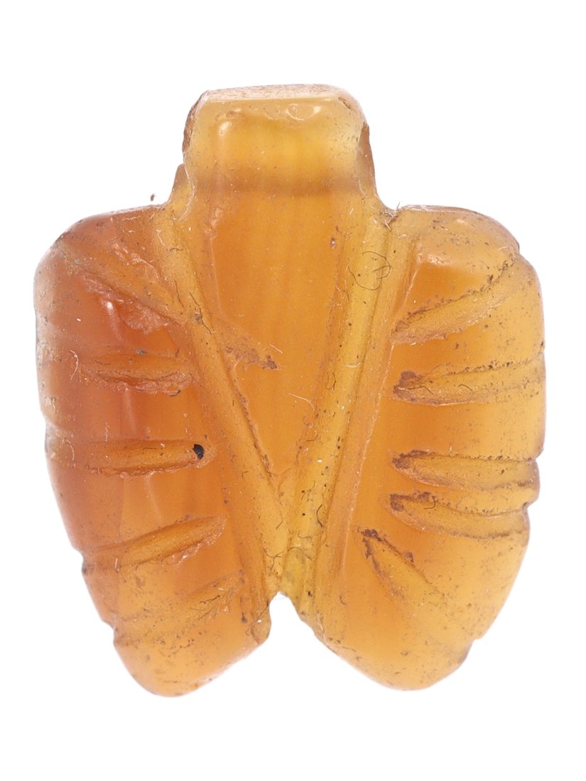 Ancient Coptic Era Egyptian Fly Amulet, 4th-6th Century AD: This exquisite gem amulet, shaped like a fly, hails from the era of Coptic art in Egypt, specifically dated to the 4th-6th Century AD. Measuring 17x14x4mm, the amulet is a small but significant artifa