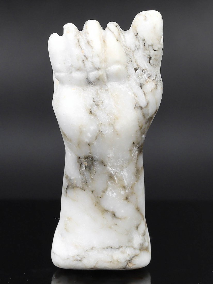 Ptolemaic Period Marble Right Fist Amulet, 664–30 B.C.: This marble amulet, carved in the form of a right clenched fist, is a relic from the Late Period to the Ptolemaic Period of ancient Egypt, dating from 664 to 30 B.C. The dimensions of this piece are 4