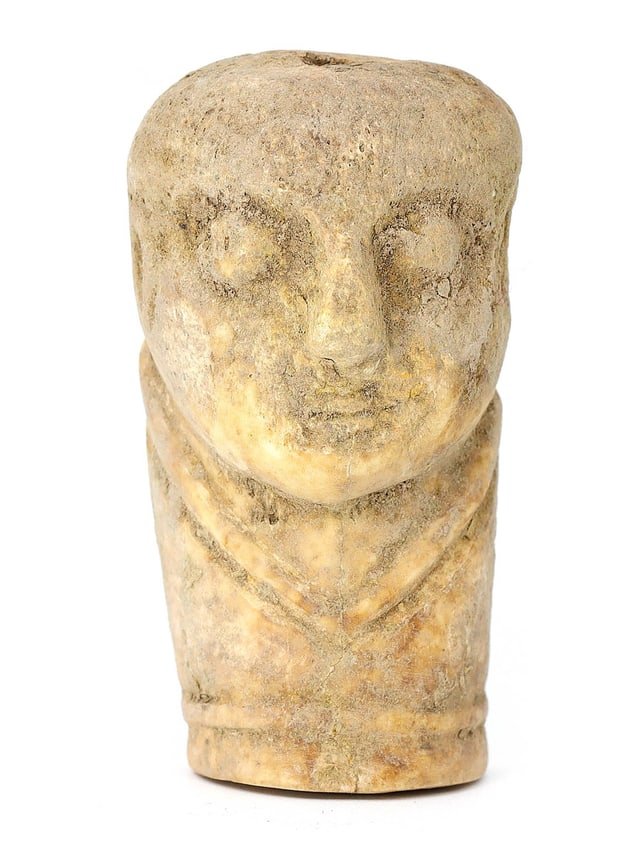 Ancient Byzantine Egyptian Carved Bone Coptic Idol Figure (c. 4th-7th Century AD): This ancient Coptic idol figure carved from whale bone hails from the Byzantine Egyptian era and measures 8 cm in height, 3.5 cm in width, and 1 cm in depth (approximately 3.15 x 1.38 x 0.39 inches). 