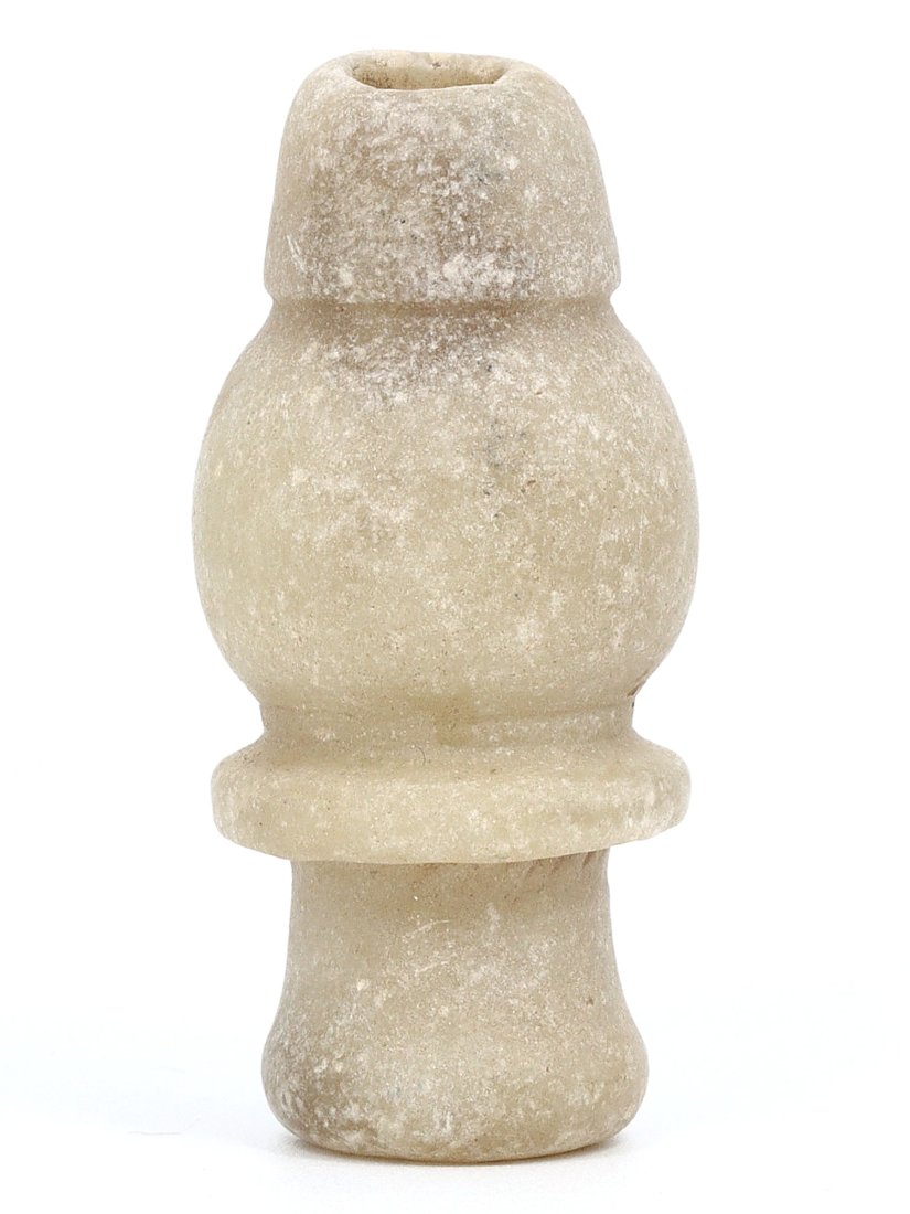 Ancient Egyptian Alabaster Spindle Whorl: This spindle whorl, meticulously fashioned from alabaster, is a representation of the daily life and artistry in ancient Egypt. A spindle whorl is a tool used in the spinning of thread or yarn and is 
