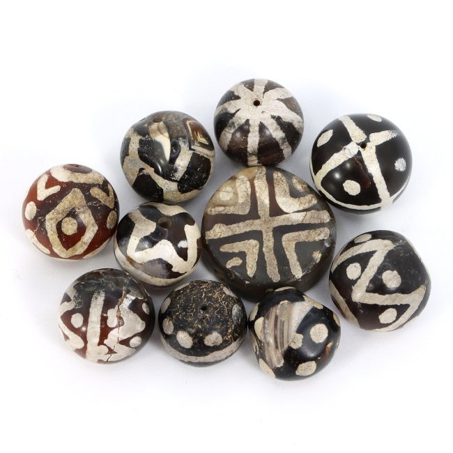 Group of 10 Ancient Tibetan Etched Black Carnelian Dzi Beads (Medieval Era): Dimensions: 9-14mm