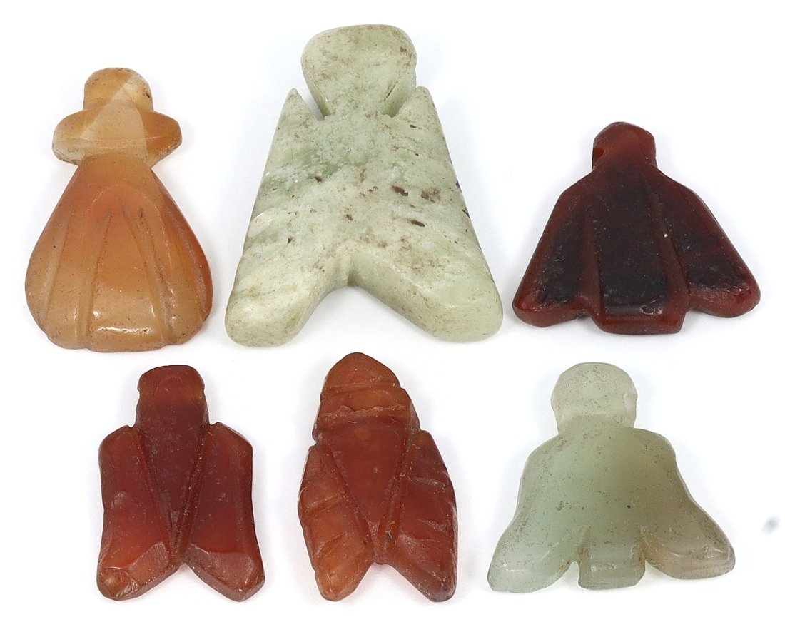 Group of Six Coptic Carnelian Agate Fly Amulets, Egypt, c. 3rd-4th Century A.D.: Crafted with remarkable finesse, this collection of six Coptic carnelian agate fly amulets from ancient Egypt dates back to the 3rd-4th century A.D. Flies were potent symbols in Egyptian iconography, 