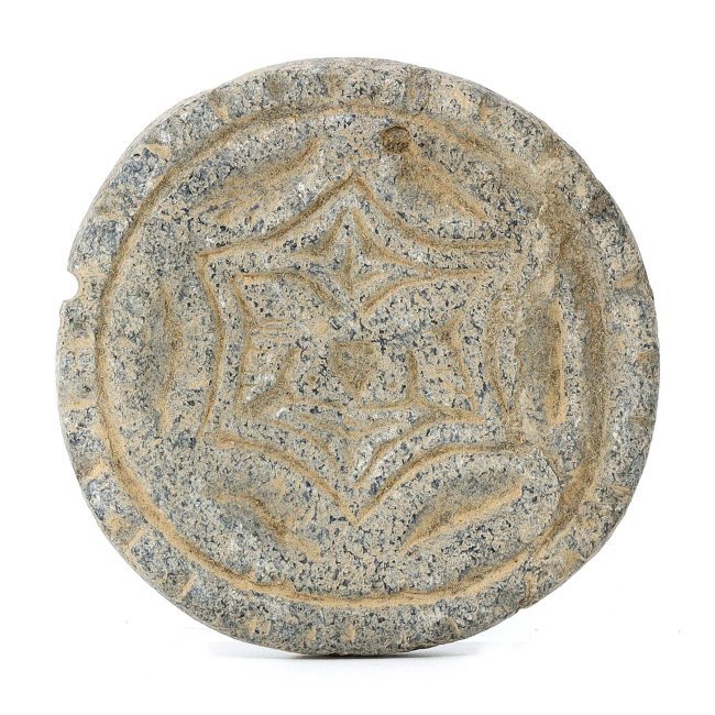Ancient Western Asiatic Stone Palette Disc, Circa 2nd Millennium BCE: This ancient stone palette hails from Western Asiatic regions and dates back to the 2nd millennium BCE, showcasing the rich cultural heritage and artistic expression of the era. The compact design, wi