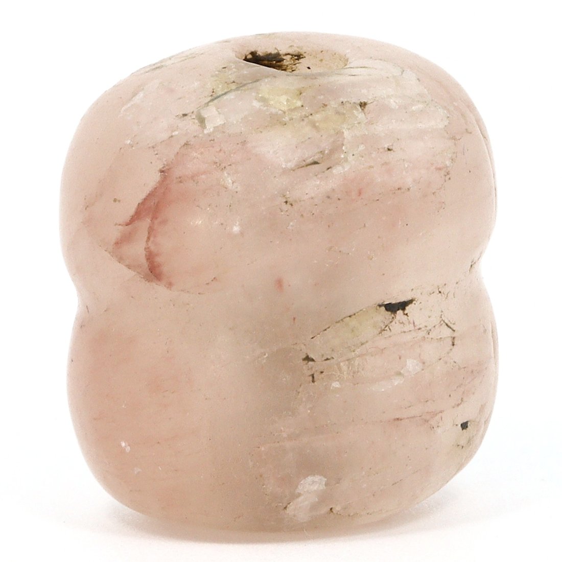 A Ptolemaic Period Egyptian Quartz Bead, c. 305-30 B.C.: This quartz bead from the Ptolemaic period in ancient Egypt, dating between 305 and 30 B.C., is a testament to the exquisite craftsmanship of the time. Its soft pink hue and translucent nature capture