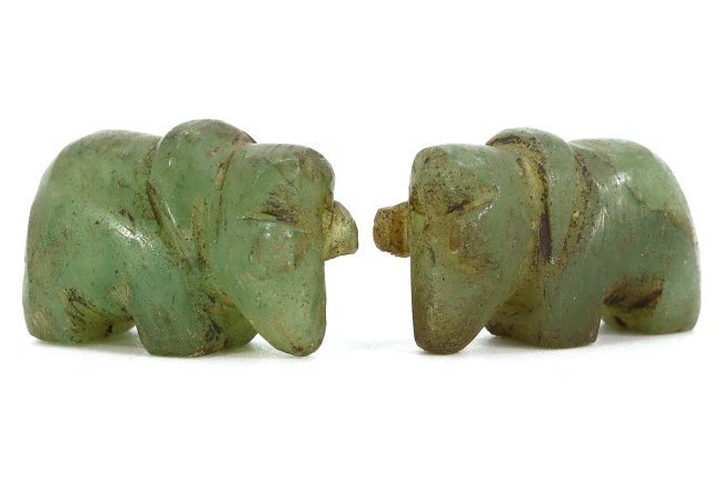 10th-12th Century Indo-Himalayan Nephrite Jade Elephant Amulets: This pair of nephrite jade elephant amulets, each measuring 14 mm by 14 mm (approximately 0.55 inches by 0.55 inches), dates back to the 10th-12th century AD, a period known for its remarkable cross-c