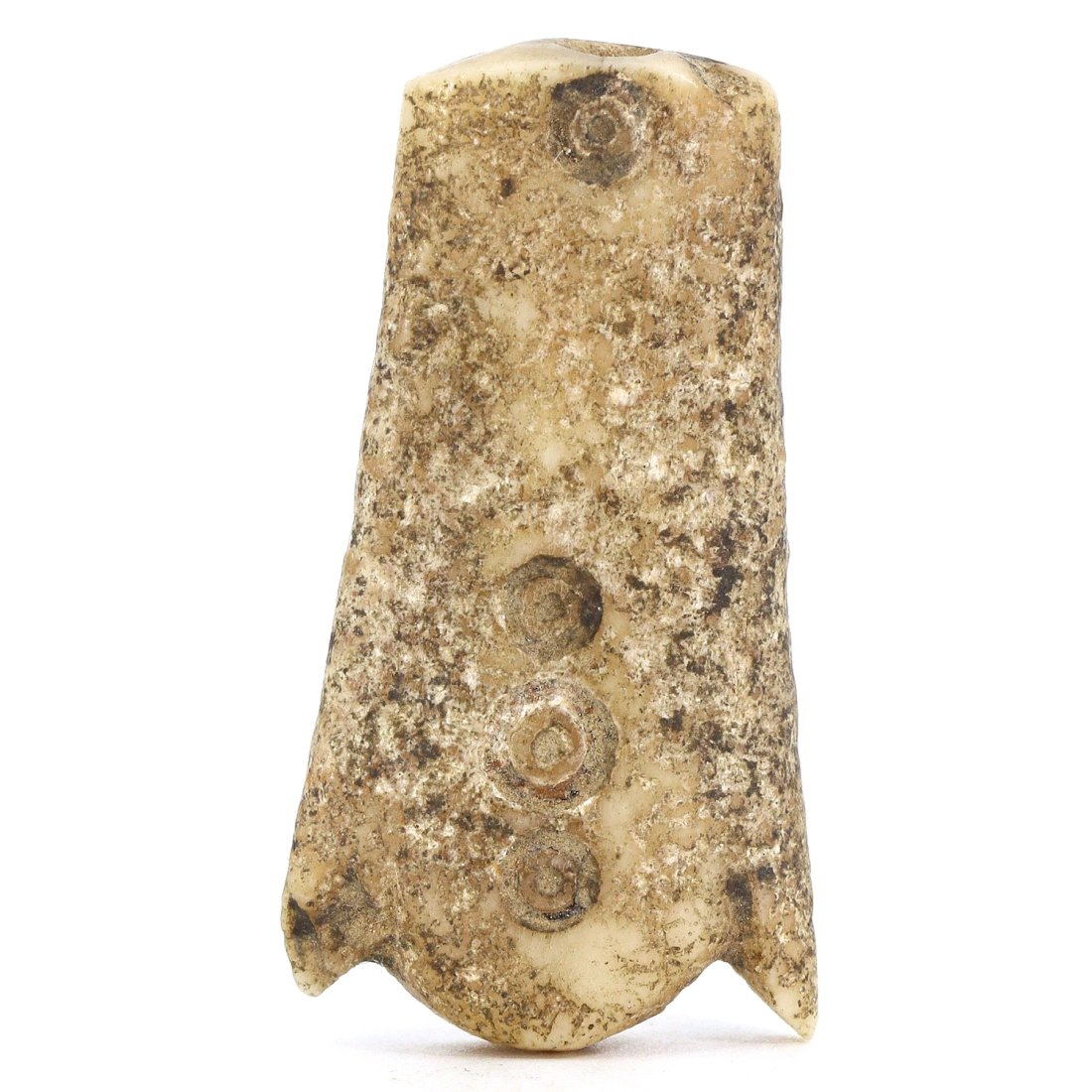 An Ancient Egyptian Bone Ornament, New Kingdom, 1550-1070 BC: Delicately carved from bone, this ornament from Egypt's New Kingdom period reflects the intricate craftsmanship of the time. Its size, 3.6x1.9 cm, and the geometric pattern etched into its surface sug