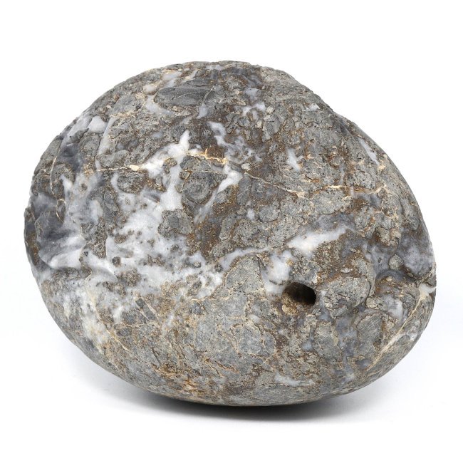 An Ancient Egyptian Stone Mongoose Head, Late Period: This stone carving, measuring 9 cm by 7 cm, is a sculptural representation of a mongoose head, an animal known in ancient Egypt for its protective qualities against snakes. The abstract form and minim