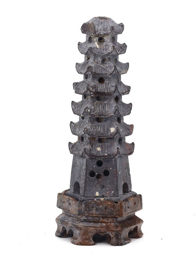 Oriental Chinese Soapstone Pagoda Figurine, Qing Dynasty: A representation of spiritual ascension and architectural finesse, this Oriental soapstone pagoda figurine from the Qing Dynasty, standing at 15x6 cm, is a sculptural microcosm of a temple tower. Carv