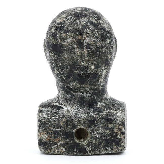 An Ancient Near Eastern Chlorite Bust, 3rd Millennium BCE: This remarkable chlorite bust, with dimensions of 4 x 2.5 cm, embodies the sophisticated artistry of the Near Eastern region during the 3rd millennium BCE. The minimalist, yet evocative form captures 