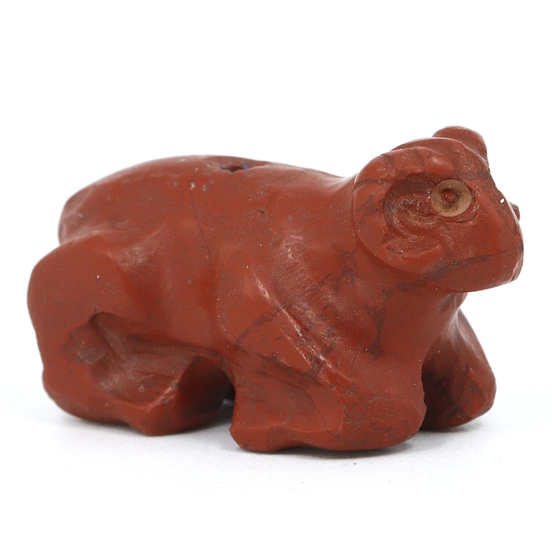 A Mesopotamian Jasper Ram Figurine, 2nd Millennium BCE: This striking jasper figurine, diminutive at just 2x1.5 cm, depicts a ram, an animal frequently symbolizing power and virility in the ancient Near East. Carved in the 2nd millennium BCE, it exemplifie