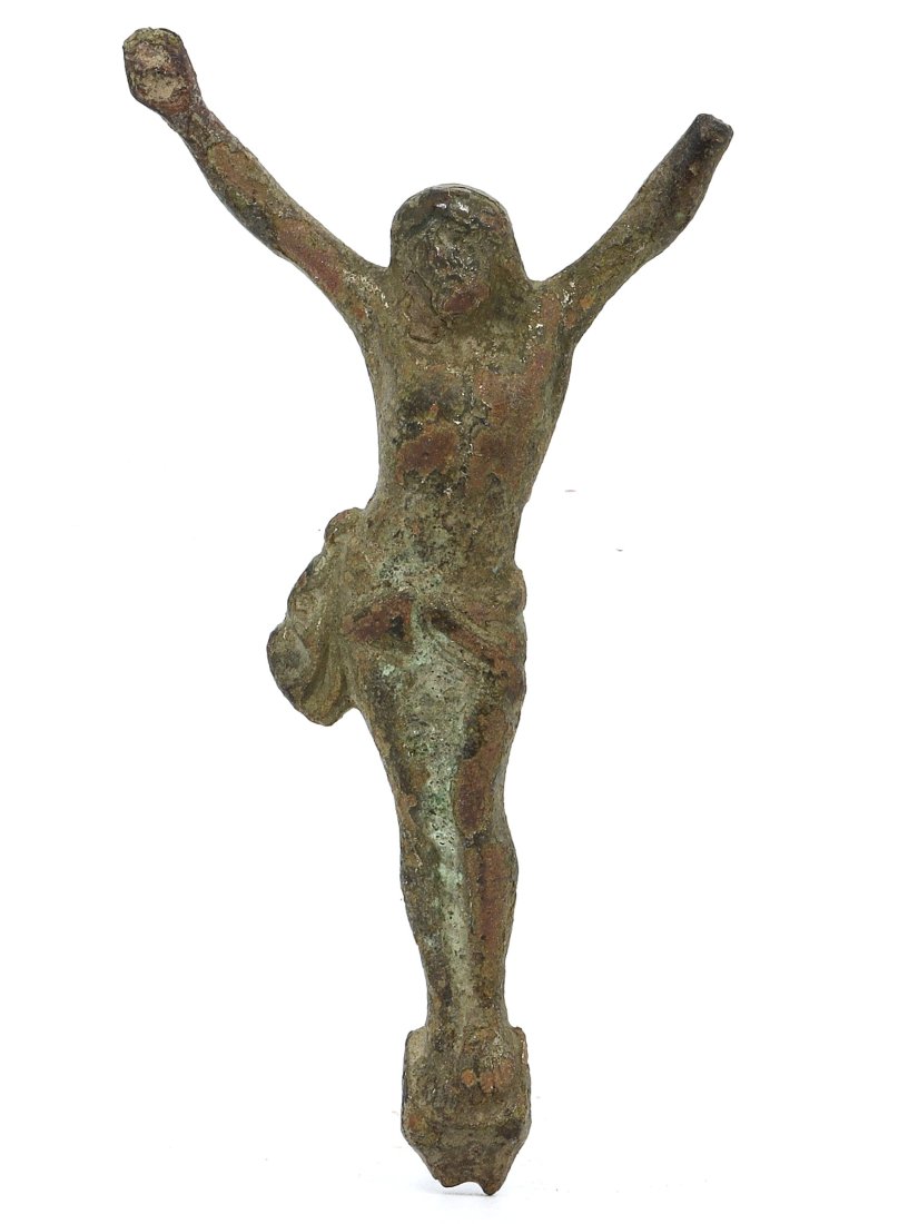 A Byzantine Bronze Figure of Christ, Circa 5th-7th Century AD: This diminutive Byzantine bronze figure of Christ, spanning 6x3 cm, emanates a sense of devotional artistry from late antiquity. Its gestural language, with outstretched arms, symbolizes the universal