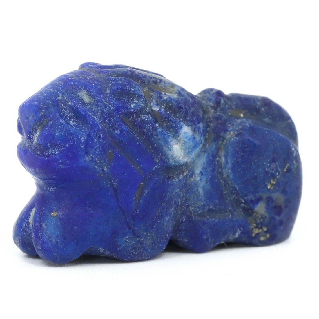 An Ancient Mesopotamian Lapis Lazuli Lion Amulet: This lapis lazuli amulet, hewn into the form of a lion, emanates the raw power and regality that characterized ancient Mesopotamia. Its compact size of 2.5 by 1.5 centimeters belies the weighty signif