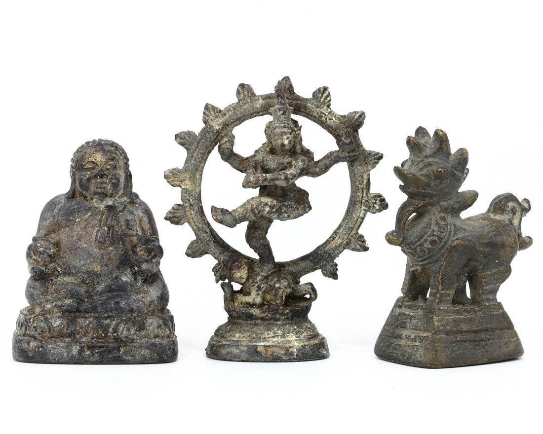 A Trio of Tibetan Himalayan Antique Bronze Figures: This trio of antique bronze figures from the Tibetan Himalayan region, each standing 7.5 centimeters tall and 5.5 centimeters wide, represents a rich tapestry of spiritual iconography. The collection