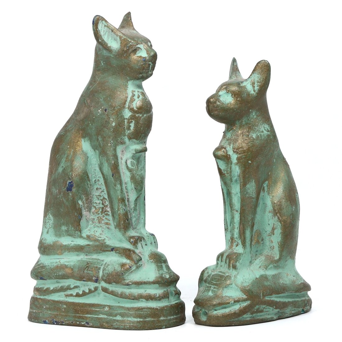 Ancient Egyptian Homage to the Divine: Terracotta Bastet Statues Adorned with Scarab and Cobra: A pair of terracotta statues rise in silent tribute, each capturing the revered image of Bastet, the goddess of home, fertility, and protection. With a scarab on one and a cobra on the other, symbols 