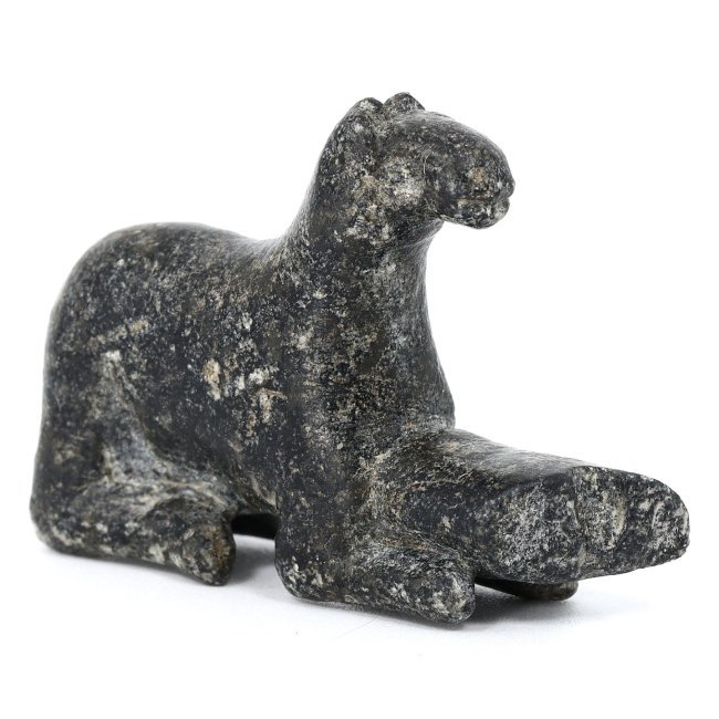 Guardian of the Afterlife: A Late Period Egyptian Steatite Figurine of Anubis: Embrace the mystique of ancient Egypt with this steatite figurine of Anubis, the revered jackal-headed god. Measuring 1.18 by 0.79 inches, this statuette is a testament to the spiritual and funerary t