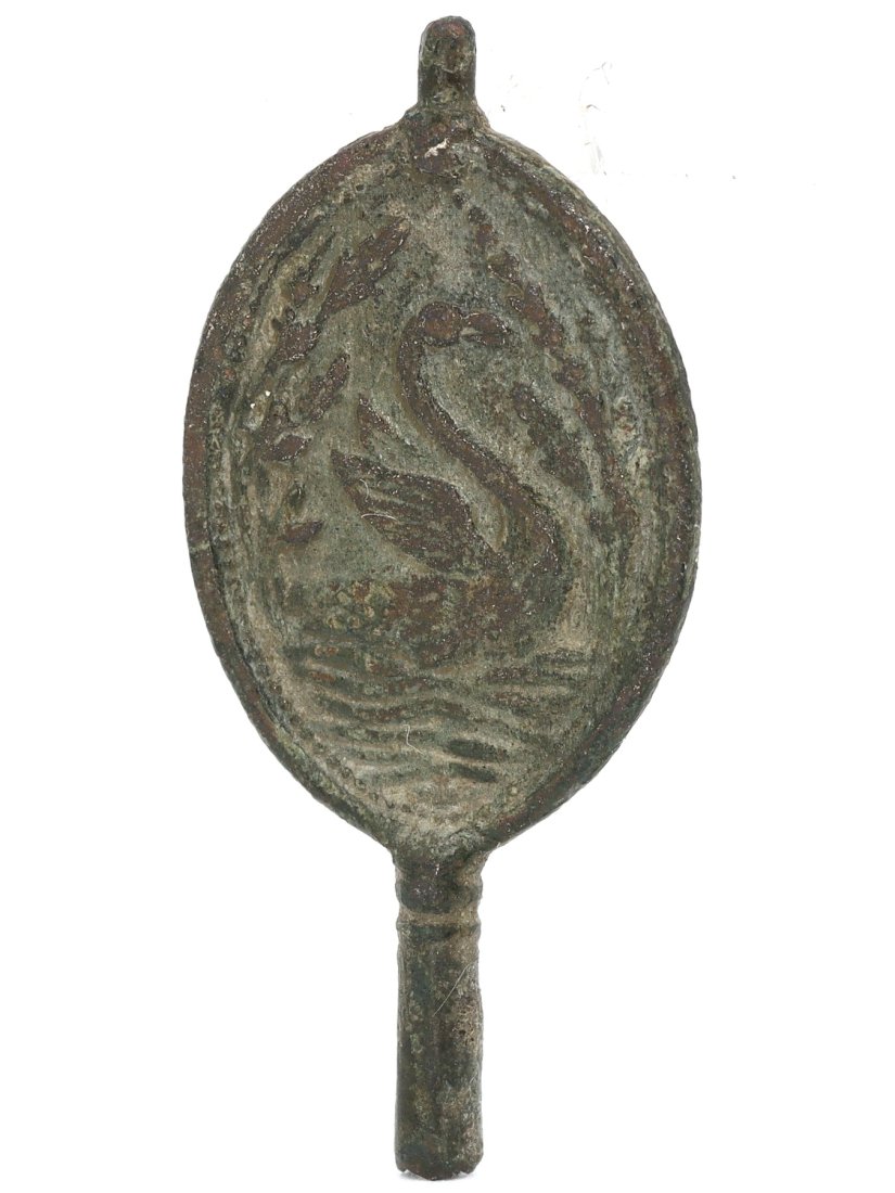 Georgian Bronze Watch Winder with Sailboat and Swan Imagery, Early 19th Century: This Georgian bronze watch winder, petite in stature, carries with it the silent tales of time and sea. On one face, a sailboat is embossed, its sails billowing—perhaps a nod to the maritime prowess