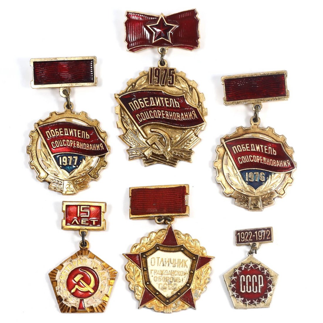 A Set of Soviet Era Military Badges, Mid-Late 20th Century AD: Collection of Soviet-era military badges, featuring symbols of valor and commemoration. These artifacts measure approximately 5.7 x 2.7 cm each, and display a variety of Soviet iconography including s