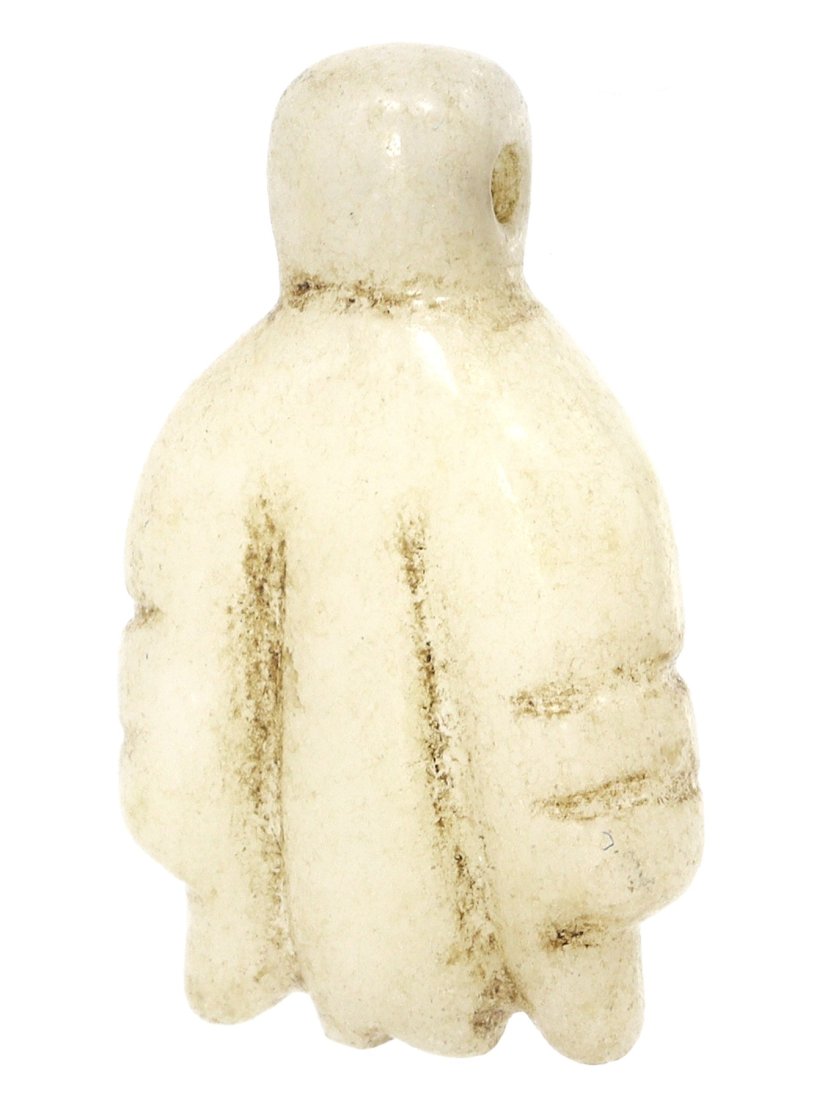 An Egyptian Stone Fly Amulet, New Kingdom Period: A small but significant ancient Egyptian fly amulet, skillfully carved from a creamy stone. Symbolizing valor, such amulets were often bestowed upon soldiers for their bravery in battle. The New Kingd